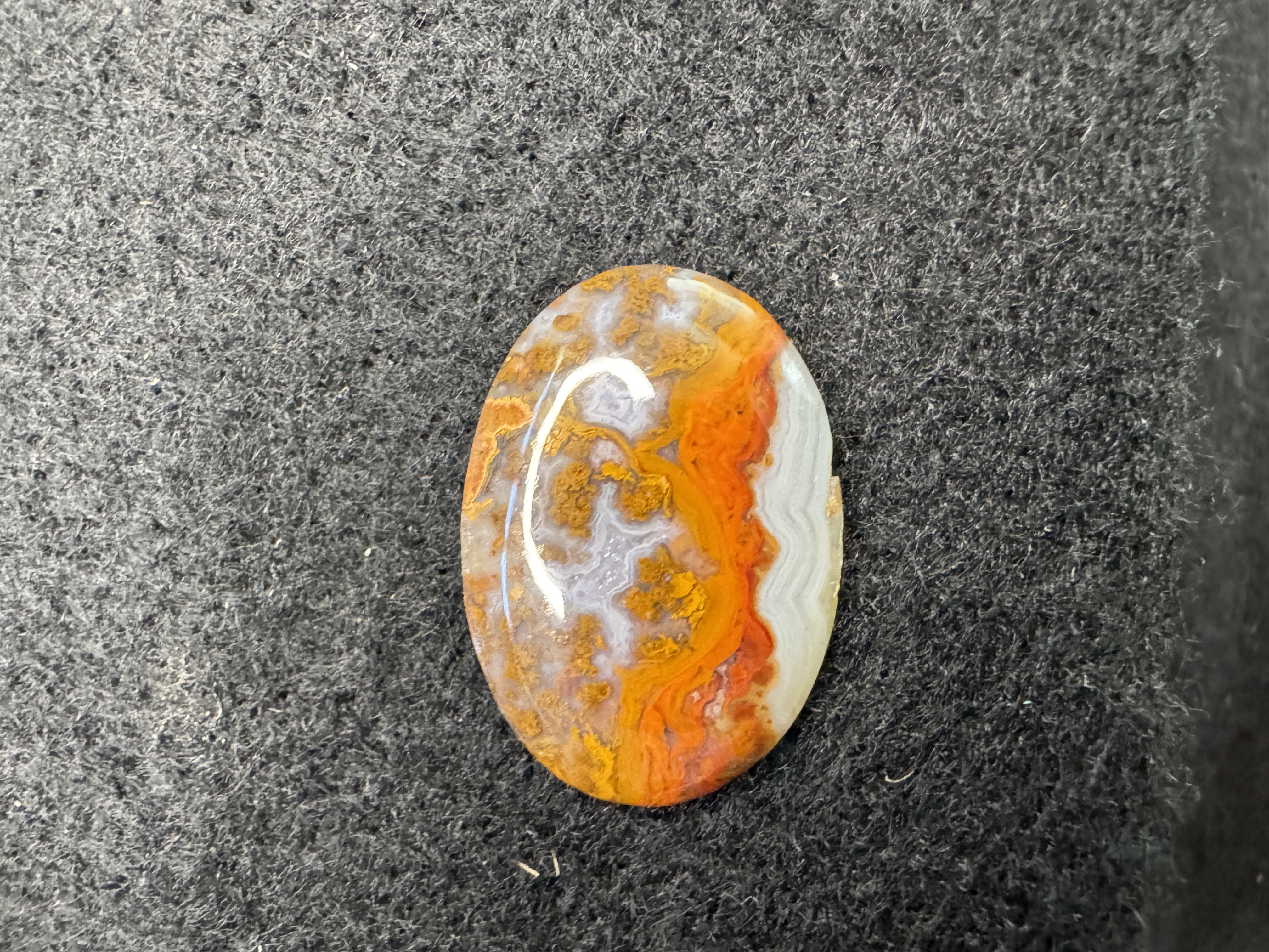 Moss Agate cabochon with intricate moss-like inclusions. Polished gemstone for jewelry making and collectors.