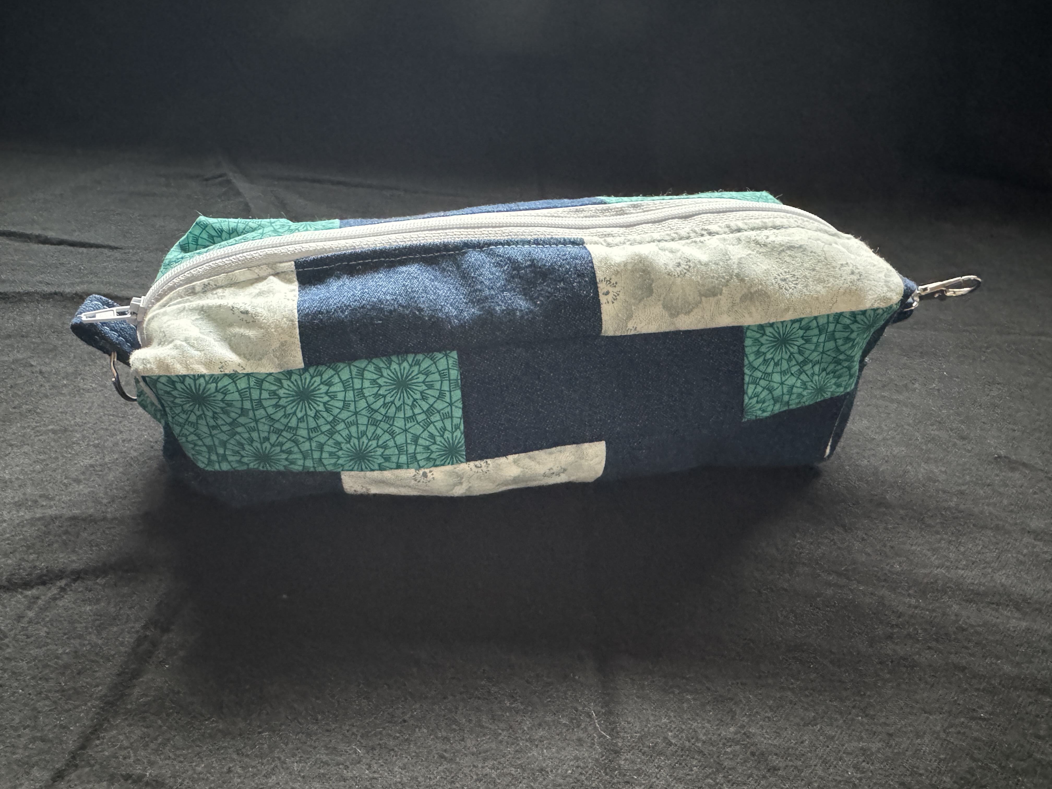 Repurposed jeans denim bag hanging hardware close up