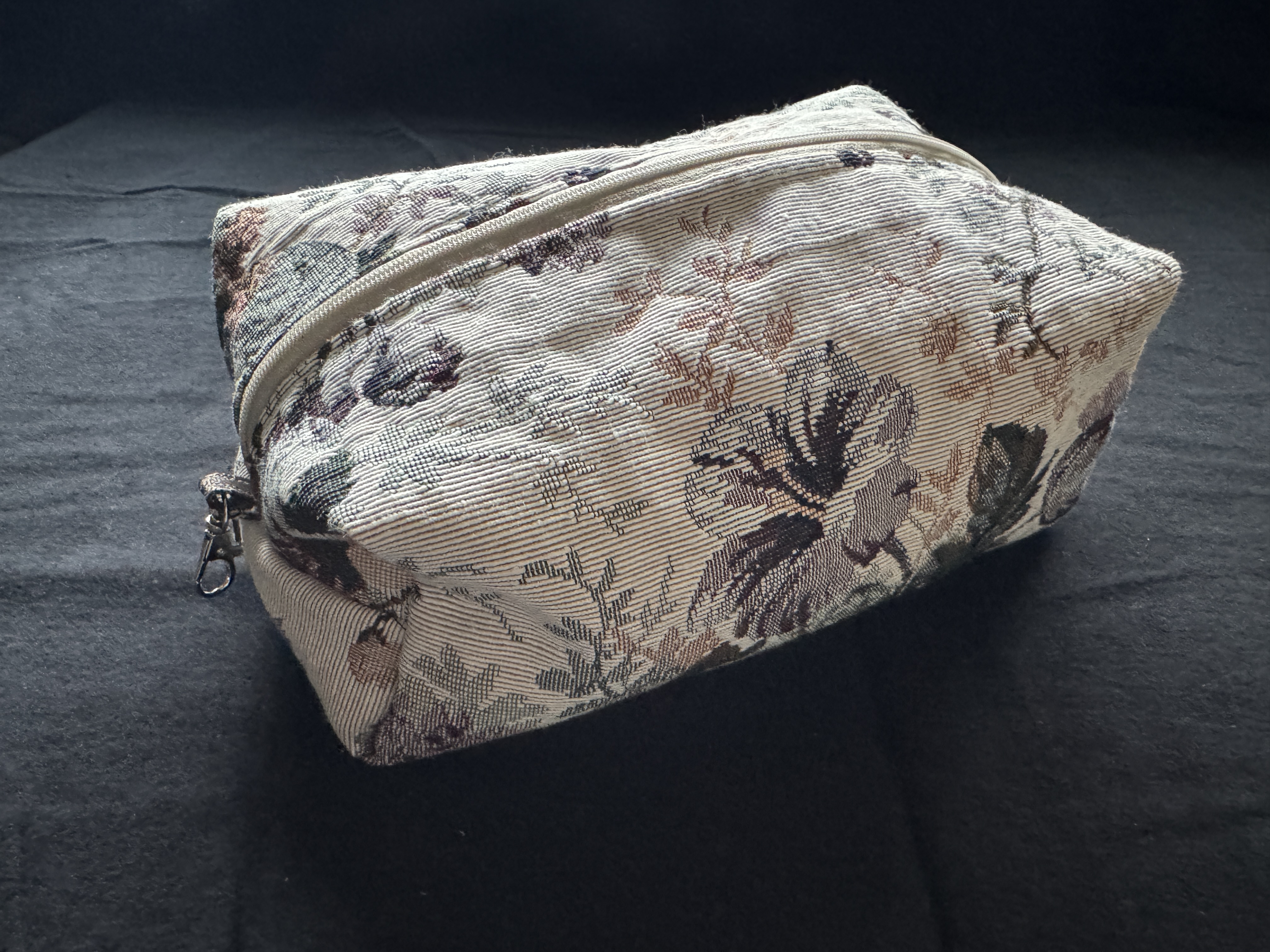 Tapestry makeup pouch clawhook attachment hardware