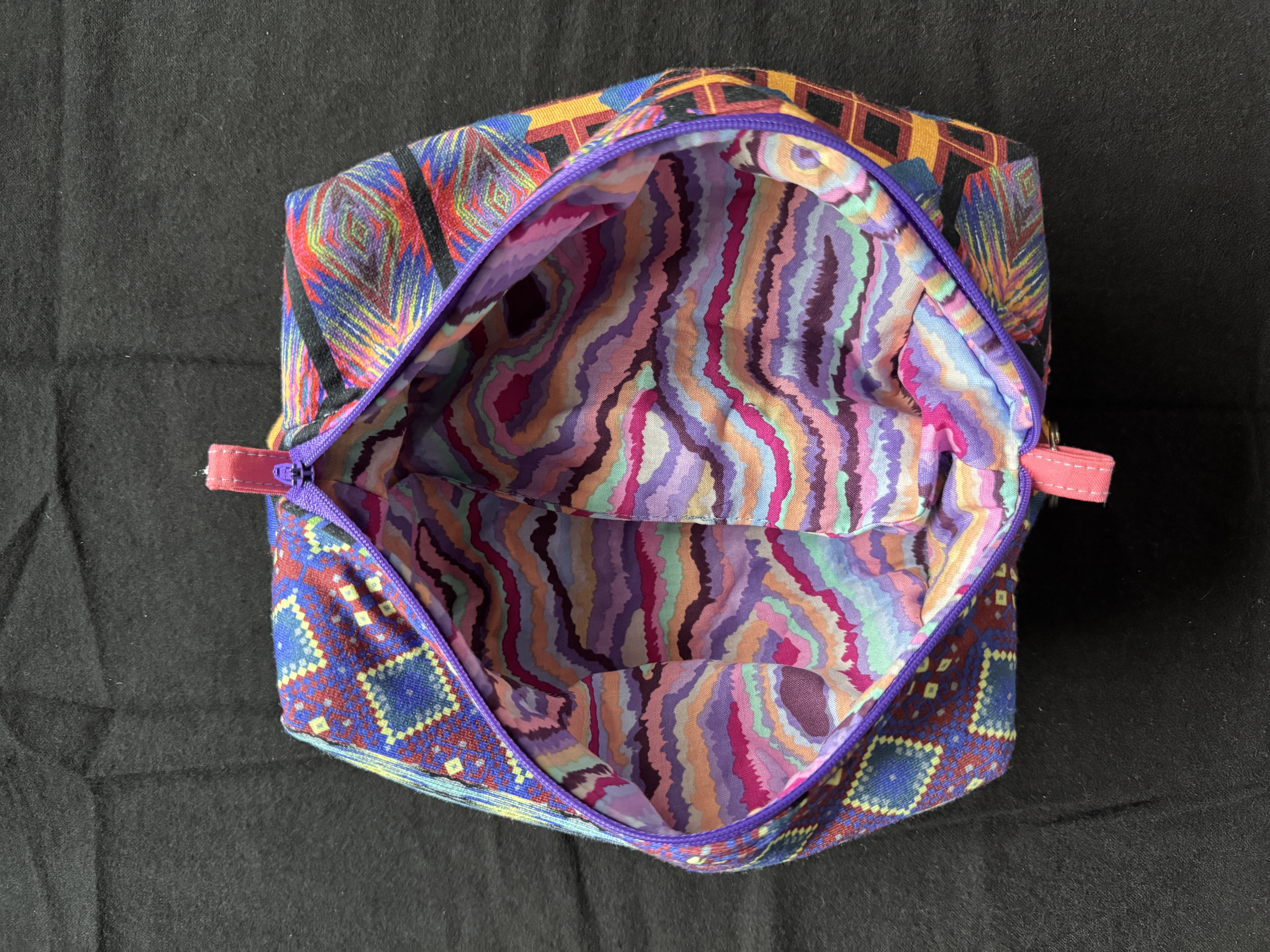 Purple hanging travel bag interior storage room