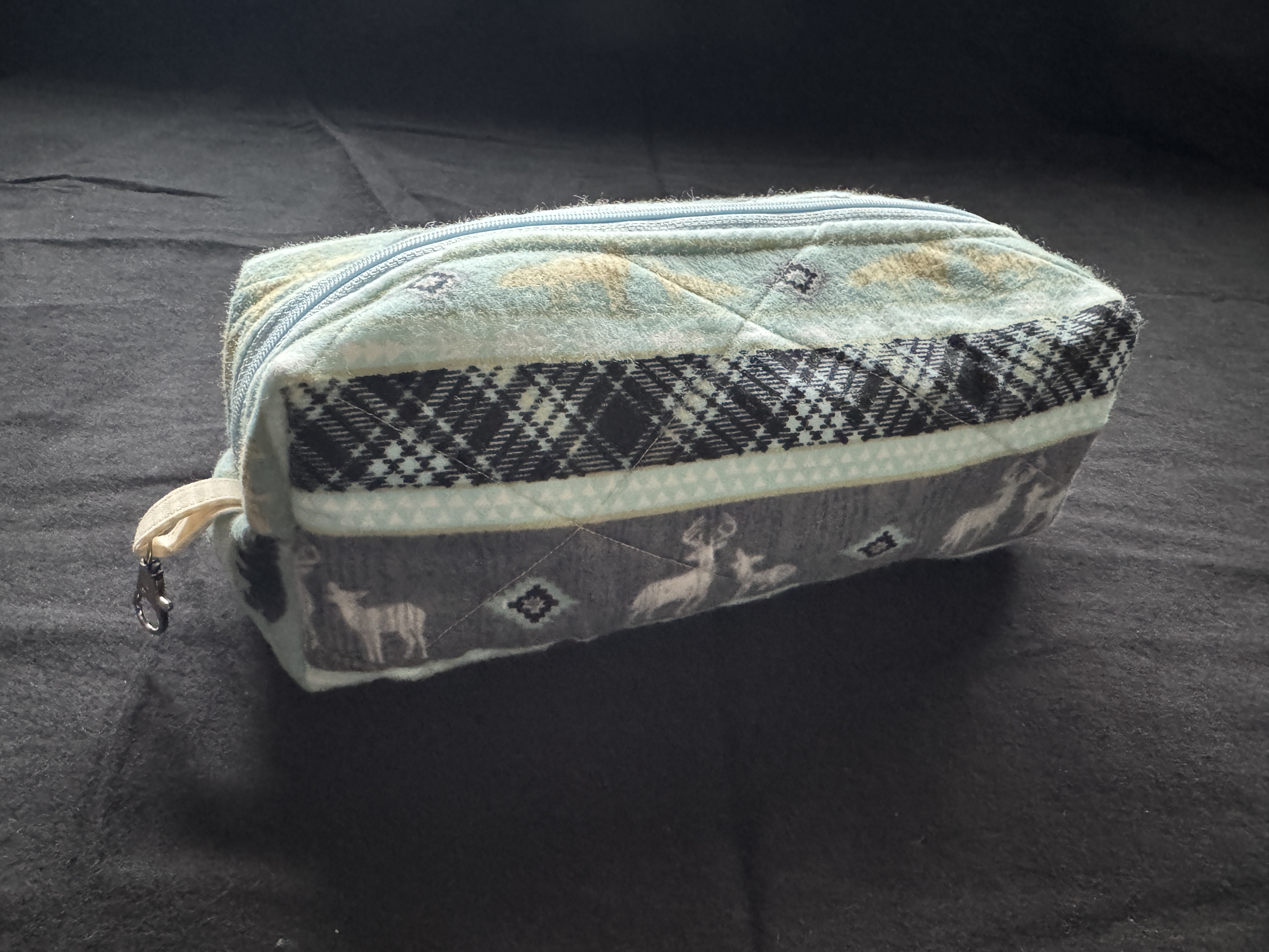 Quilted foxes and deer soft blue makeup bag