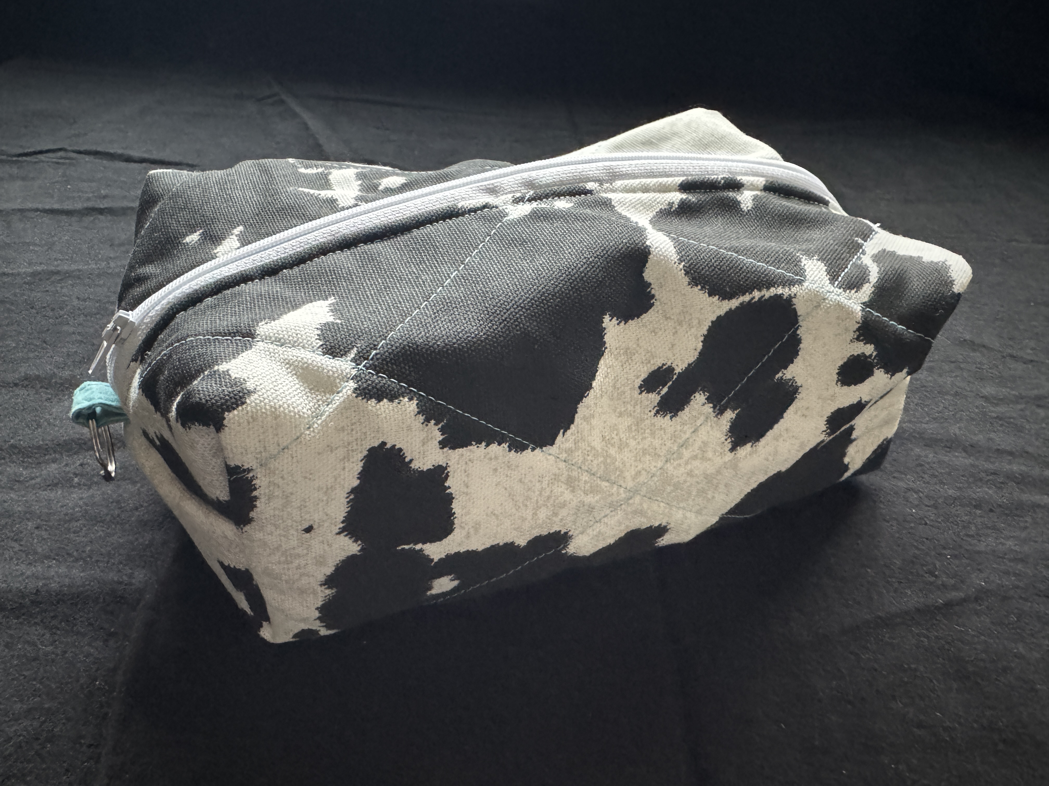 Western themed hanging cosmetics pouch side view